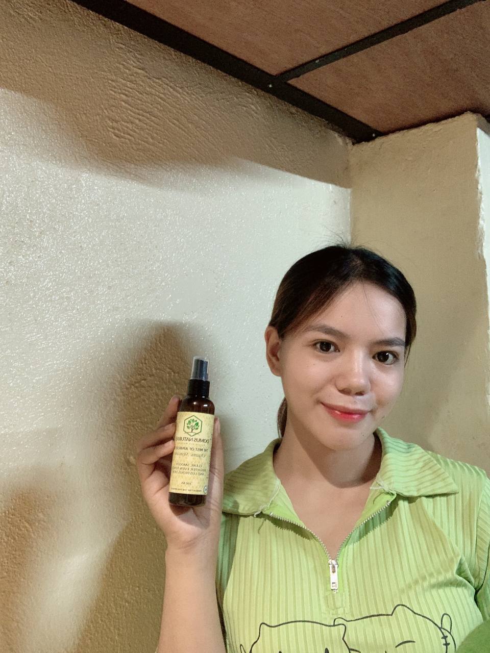 The same customer holding Mist of Aphrodite in her follow-up photo